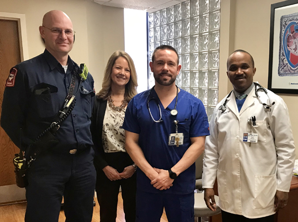 THAM-outpatientclinicBanner2 From left: Danny Martin, a paramedic with Arlington Fire, Lori Dachroeden, a senior director, Harley Brown, R.N., Sam Mbugua, a family nurse practitioner at the Texas Health Arlington Memorial outpatient clinic.