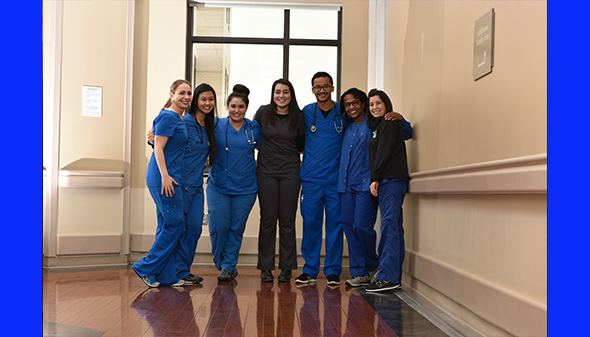 Hallway picture of Texas Health clinical staff